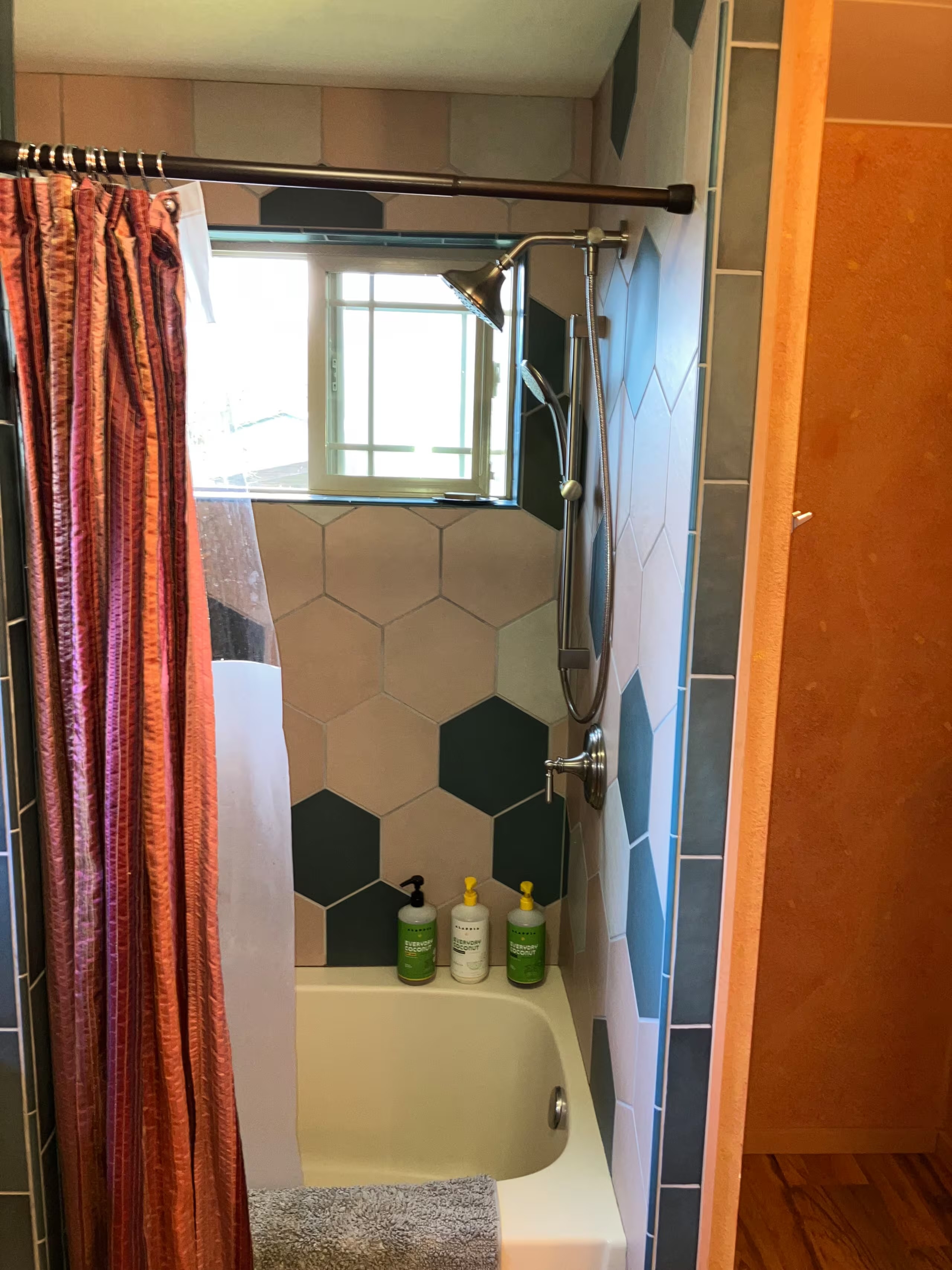 Shower with hexagon tile accents